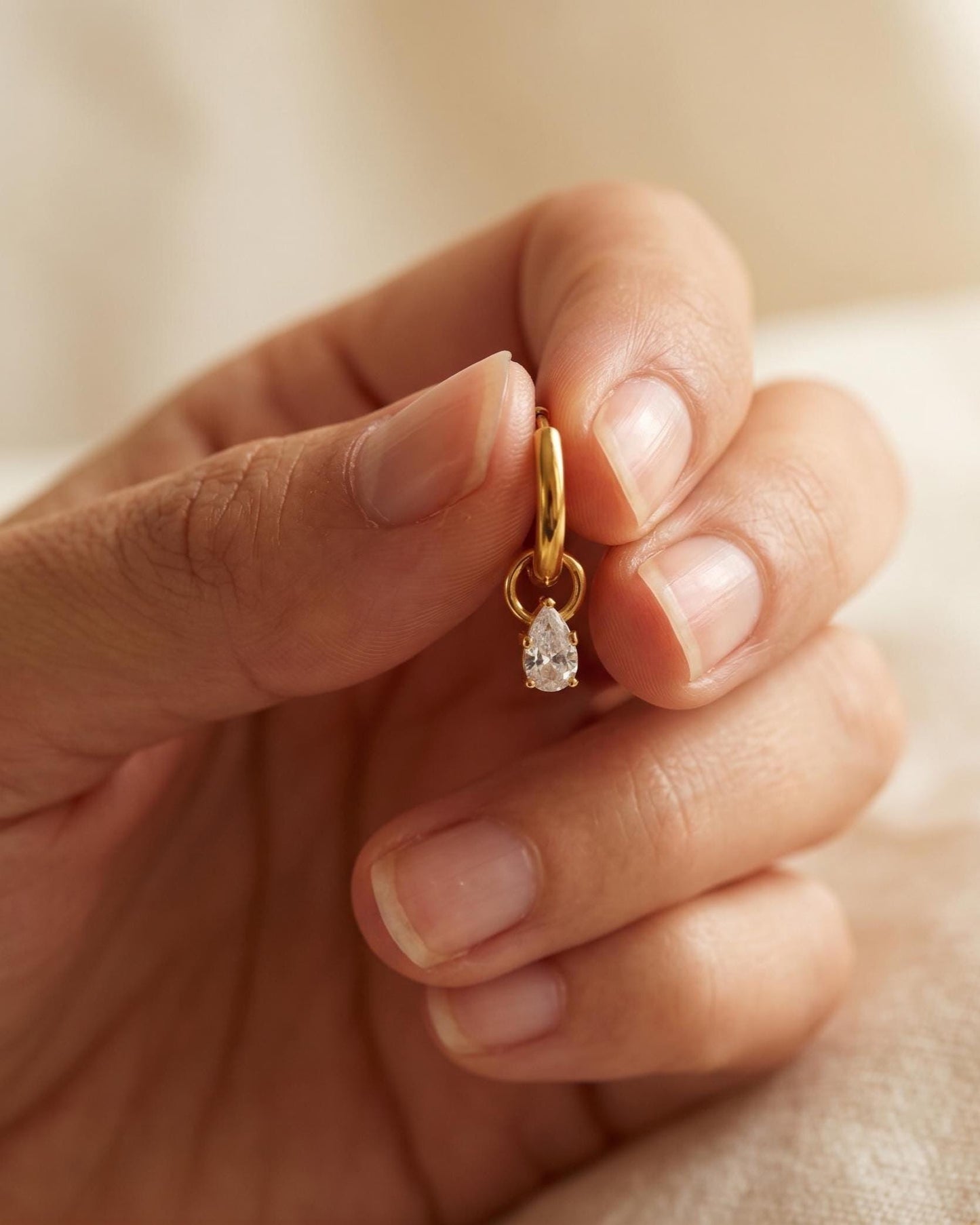 Teardrop CZ Gold Huggie Hoops