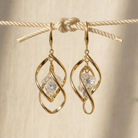 Gold Twist Crystal Drop Earrings – Sculptural Statement Hoops