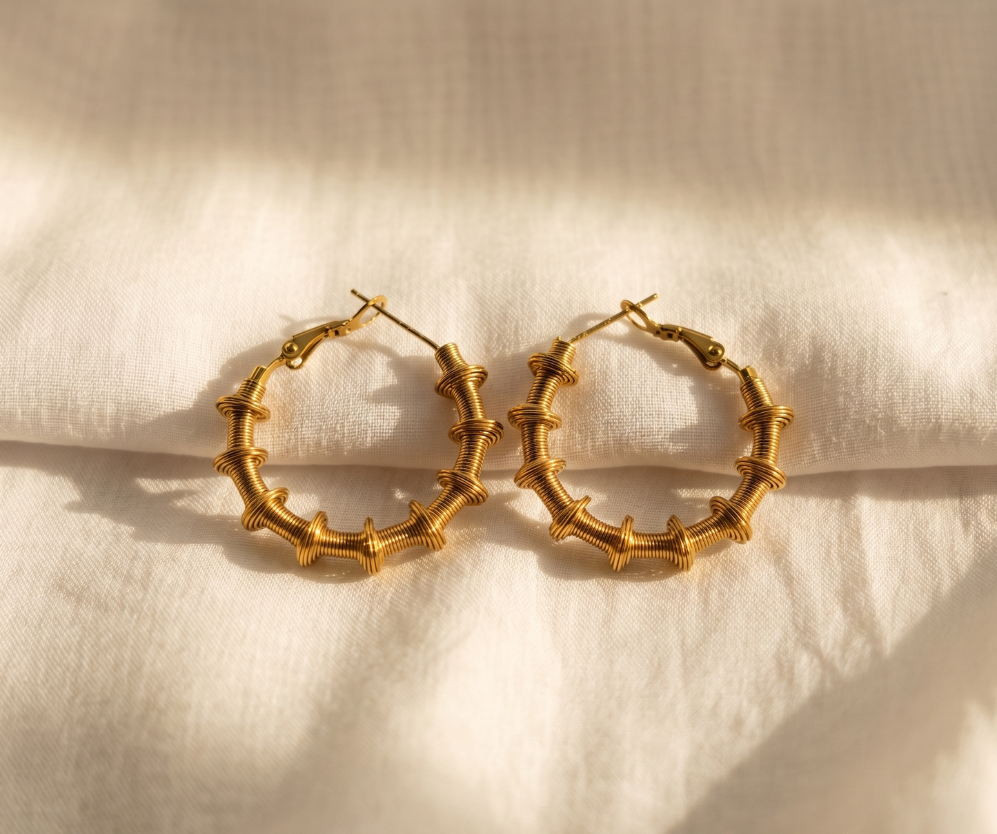 Sculpture Coil Gold Hoop Earrings