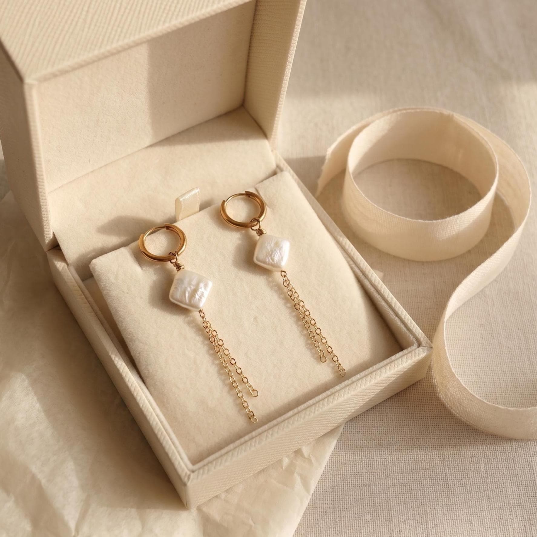 Gold huggie hoop earrings with square pearl and chain dangle, minimalist dainty jewelry
