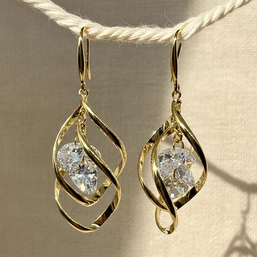 Gold Twist Crystal Drop Earrings – front view of sculptural intertwined design by VEESA BY N