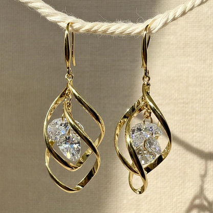 Gold Twist Crystal Drop Earrings – front view of sculptural intertwined design by VEESA BY N