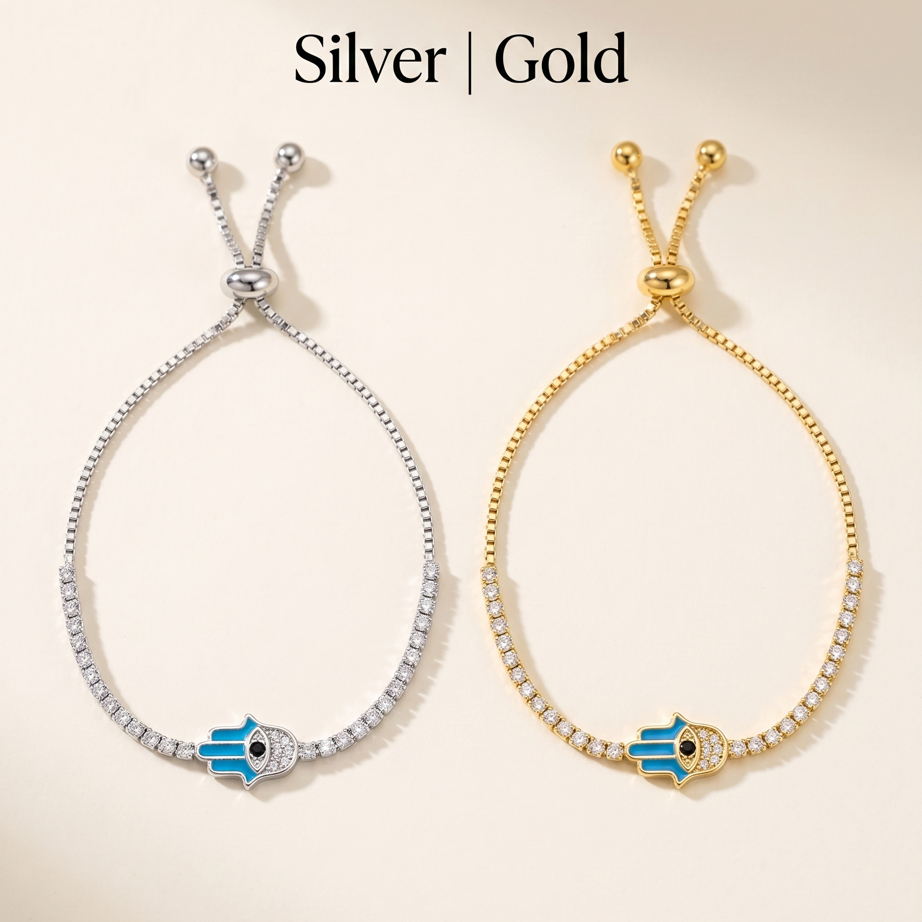 Two bracelets, one silver and one gold, with blue evil eye charms on a beige background.