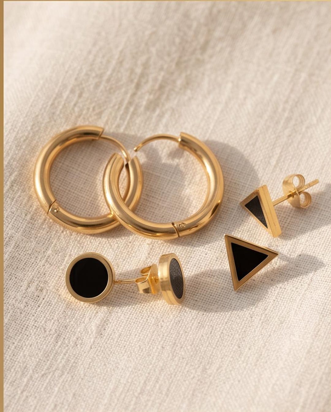 Gold earring set worn ear stack styling