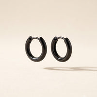 Black stainless steel 10mm huggie hoop earrings — minimalist waterproof everyday jewelry