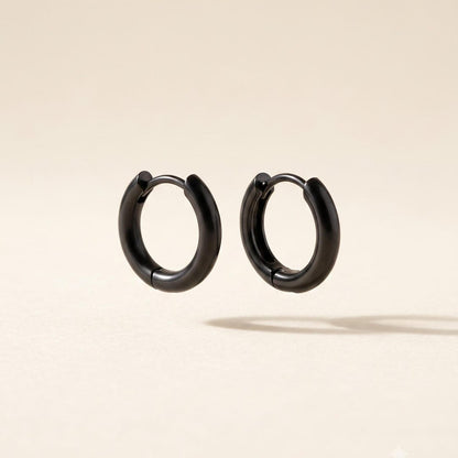Black stainless steel 10mm huggie hoop earrings — minimalist waterproof everyday jewelry