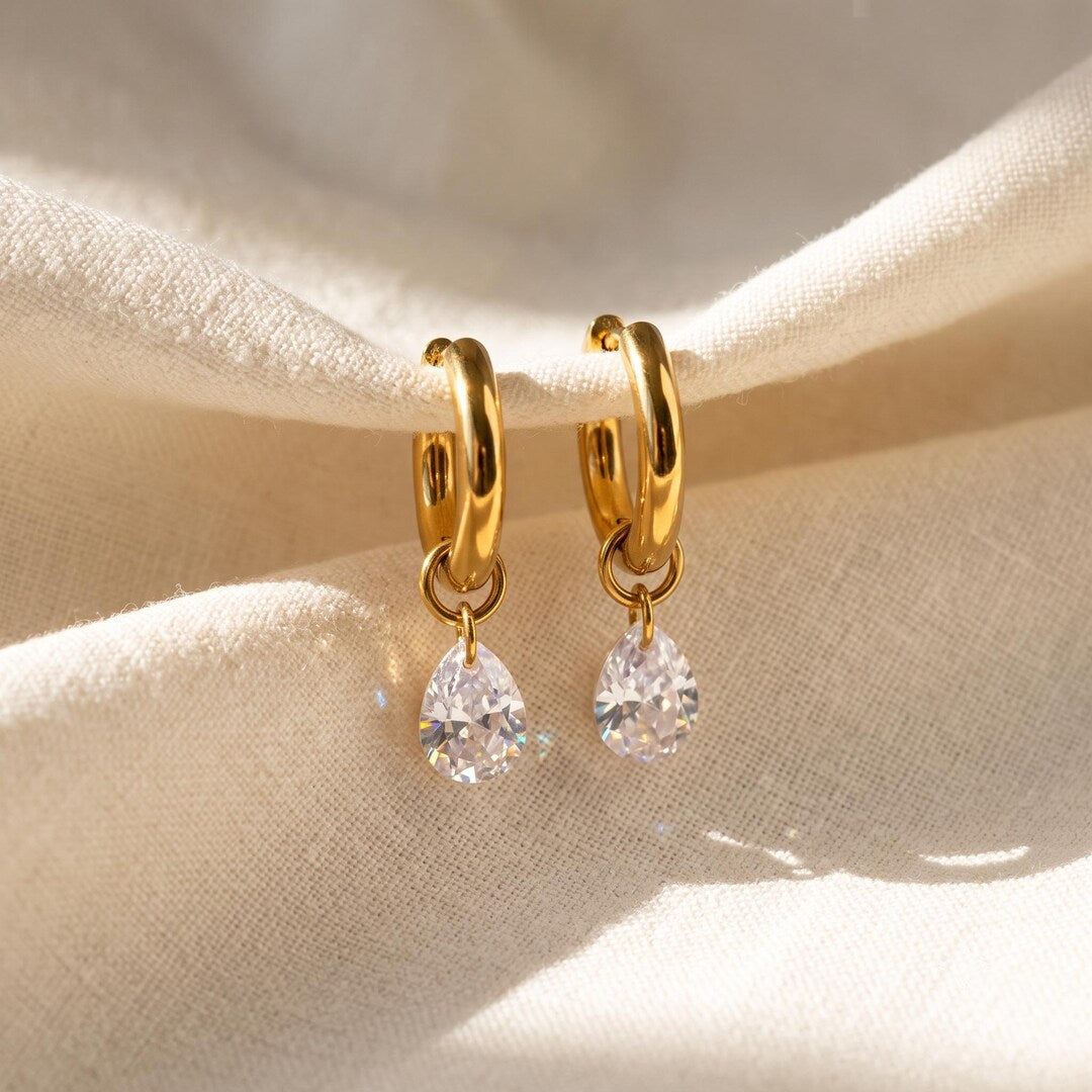 Gold Huggie Earrings with CZ Teardrop Charm