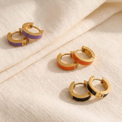 Black, purple, and orange enamel huggie hoop earrings