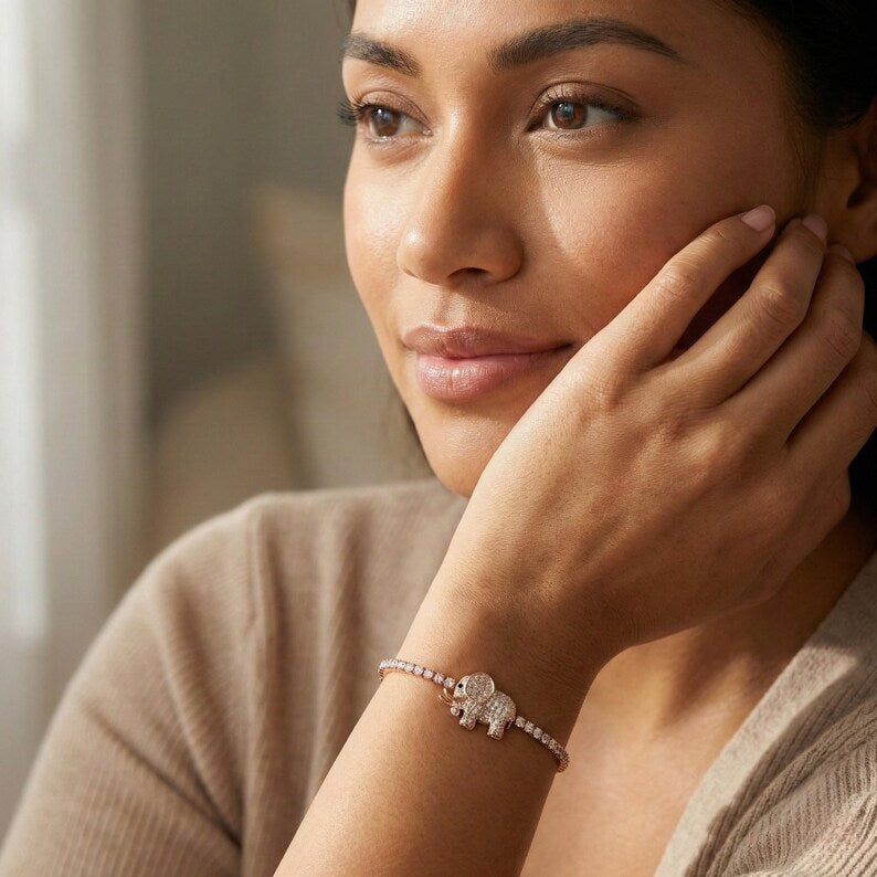 Elephant charm bracelet on wrist