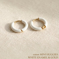 White enamel huggie hoop earrings in gold stainless steel
