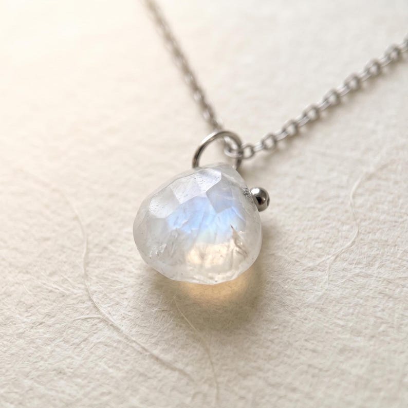Moonstone pendant necklace product flat lay