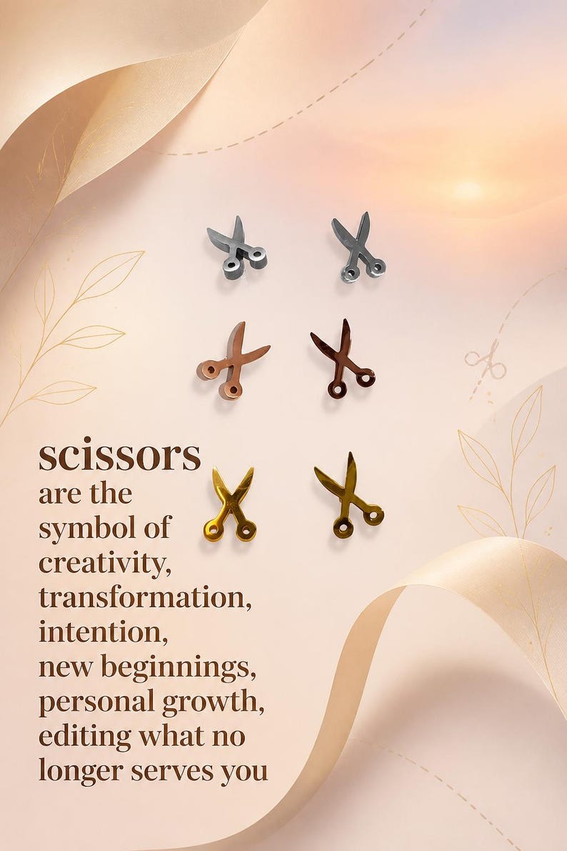Silver scissors stud earrings product flat lay