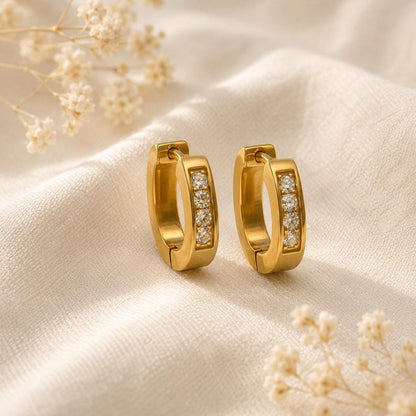 Gold horseshoe huggie hoop earrings