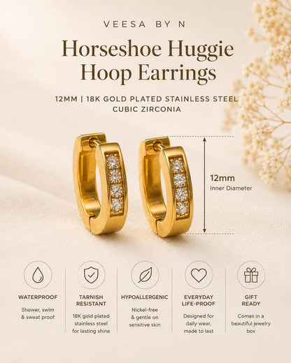 Gold horseshoe huggie hoop earrings detail