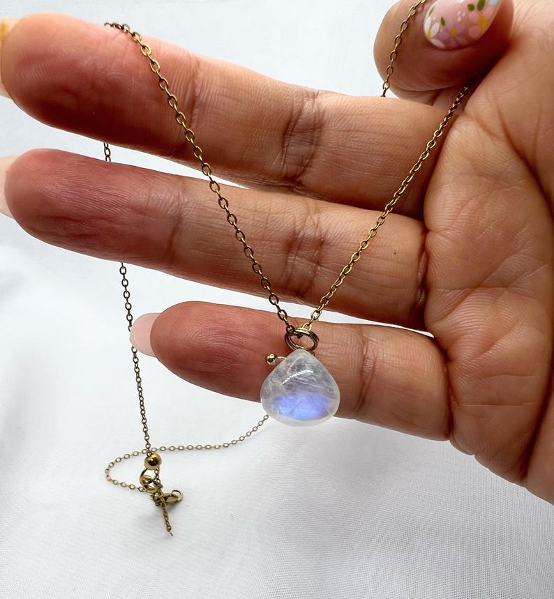 Gold moonstone necklace close up