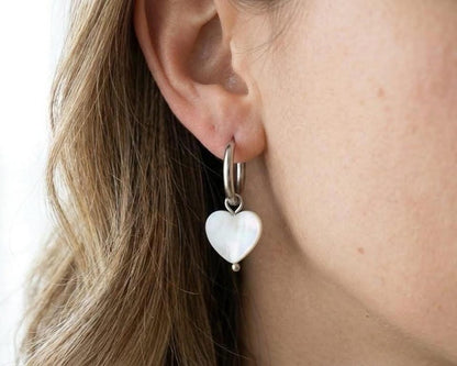 Close up of Mother of Pearl heart earring