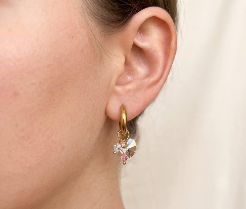 Gold hoop earrings with crystal charms