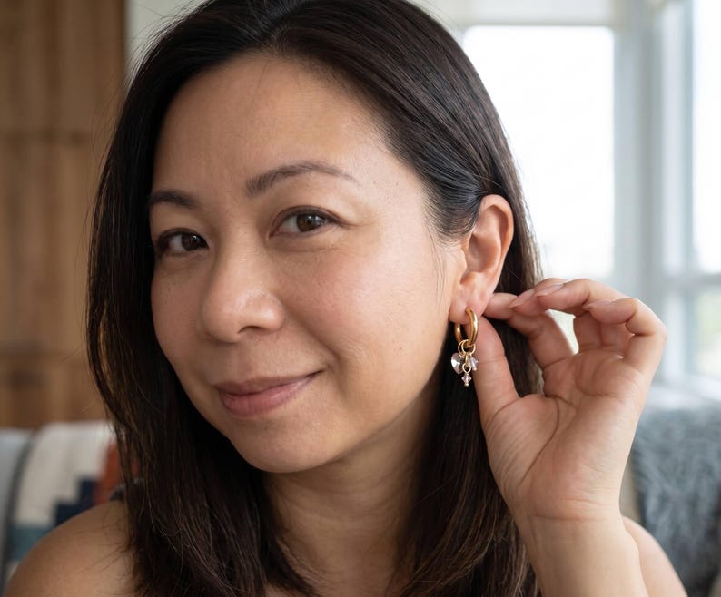 Swarovski hoop earrings worn