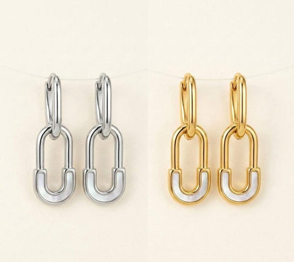 Silver and gold safety pin huggie hoop earrings side by side