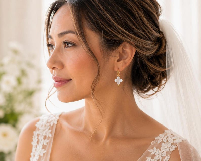 Bride wearing Mother of Pearl clover earring