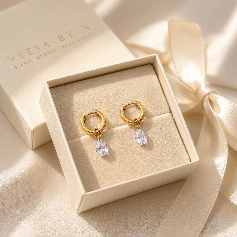 Gold huggie earrings with CZ teardrop in gift box