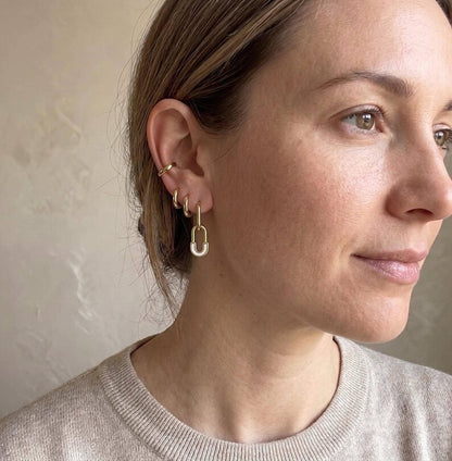 Ear stack with gold safety pin huggie hoop earring
