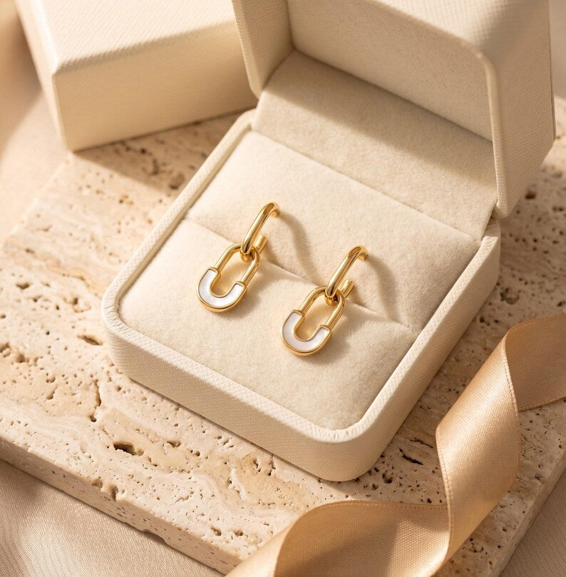Gold safety pin huggie hoop earrings in gift box