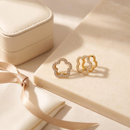 Gold flower pave earrings with leather jewelry box