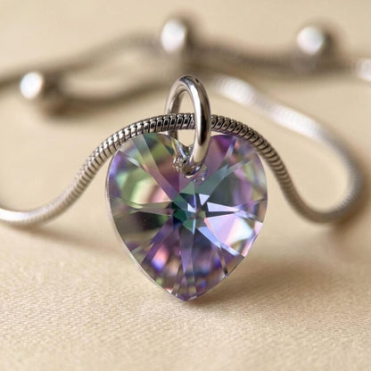 Crystal heart pendant on silver snake chain