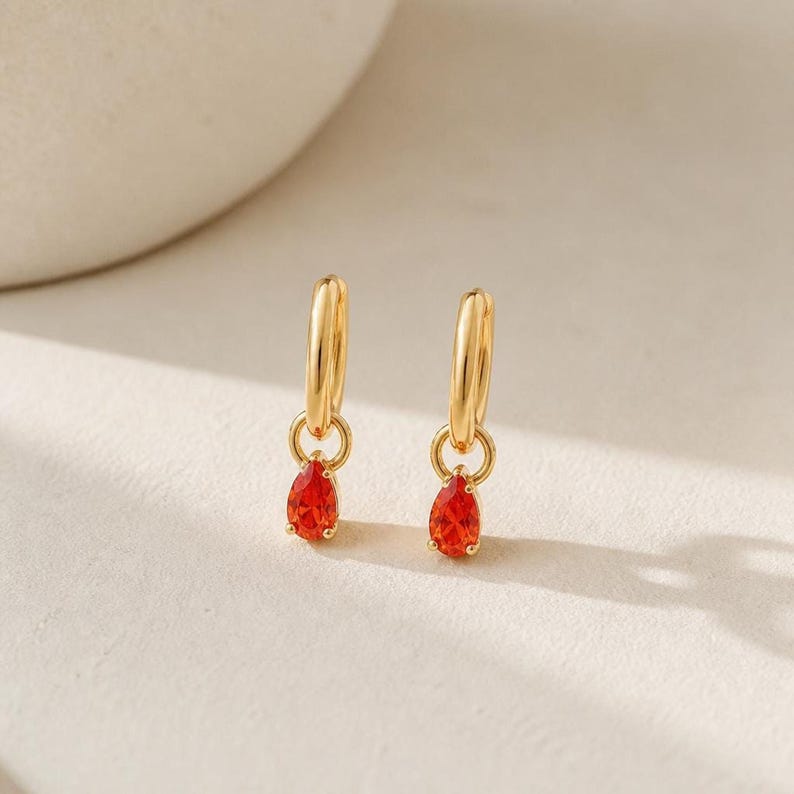 Pair of red garnet CZ huggie hoop earrings