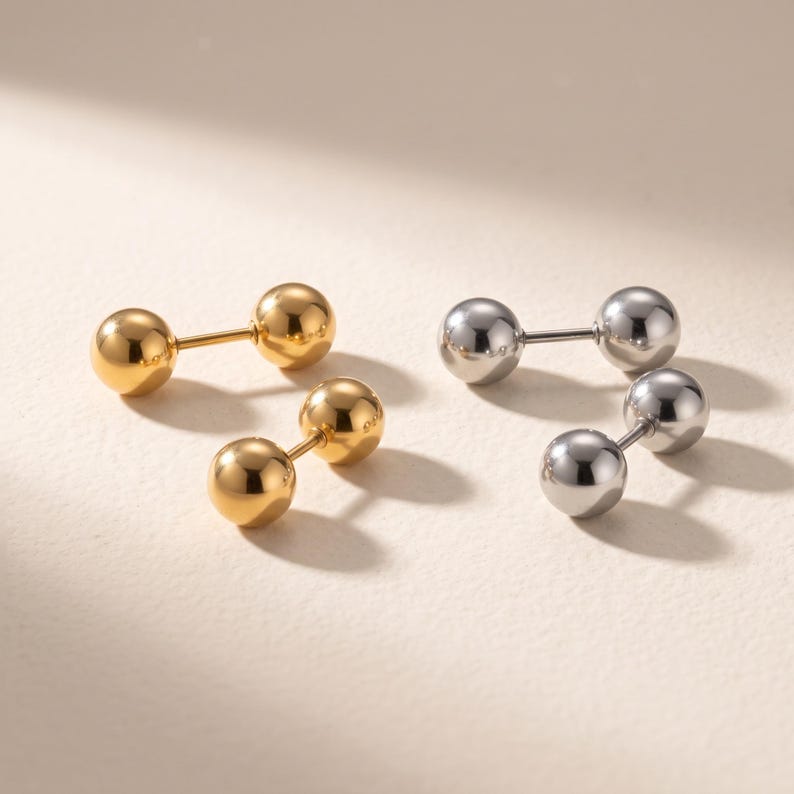 Ball stud earrings with soft lighting