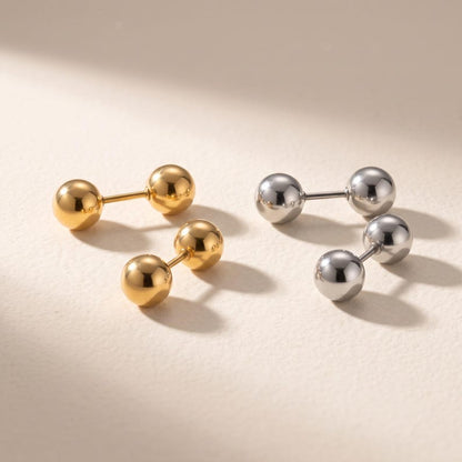 Ball stud earrings with soft lighting