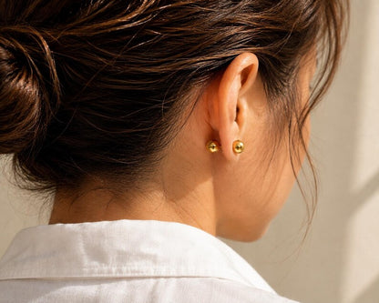 Screw back closure detail on ball stud earring