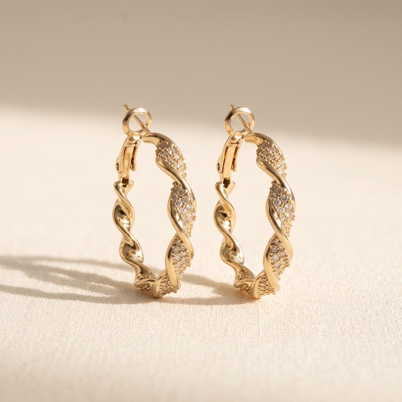 Close-up of crystal pave detail on twisted hoop