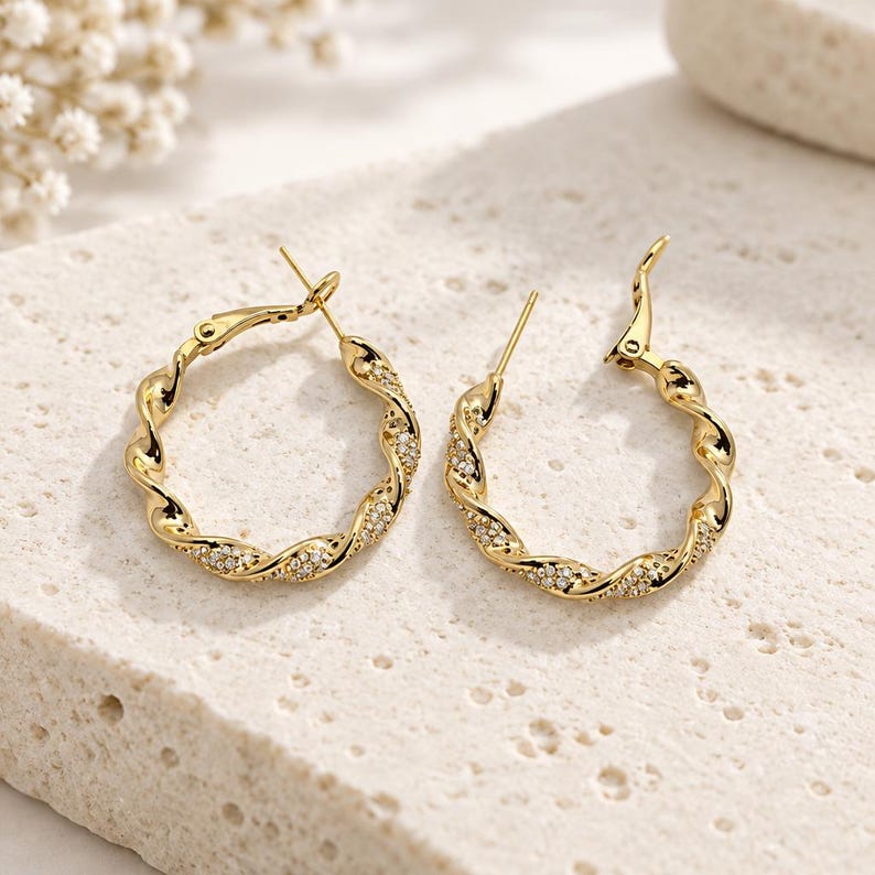Twisted hoop earrings with sparkle detail