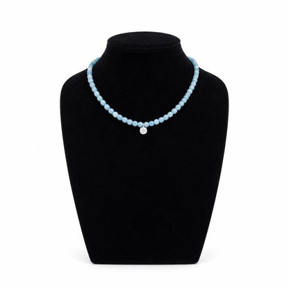 Necklace laid flat showing full design