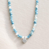 Aquamarine moonstone necklace with moissanite center stone
