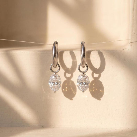 Oval moissanite floating huggie hoop earrings