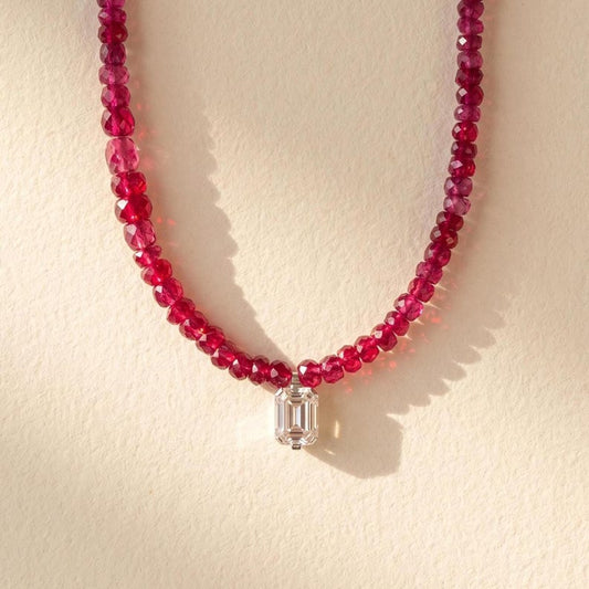 Ruby beaded necklace with emerald-cut moissanite pendant