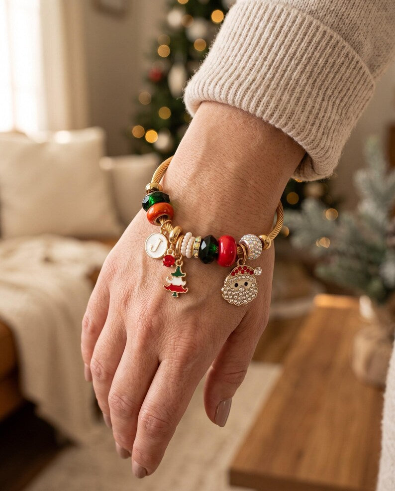 Christmas charm bracelet worn on wrist