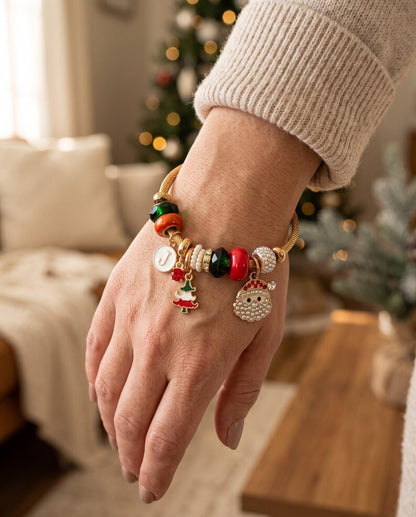 Christmas charm bracelet worn on wrist