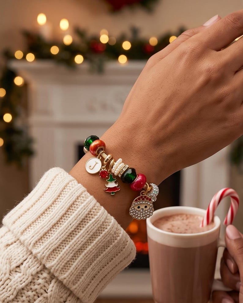 Christmas charm bracelet with personalized initial charm detail
