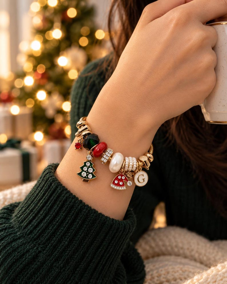 Christmas charm bracelet worn on wrist