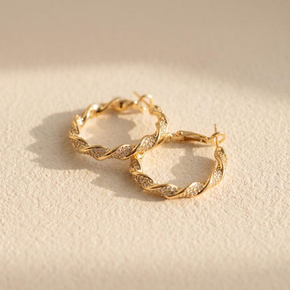 Twisted hoop earrings styled with outfit