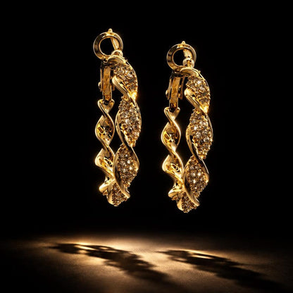Side profile wearing twisted crystal pave hoop earring
