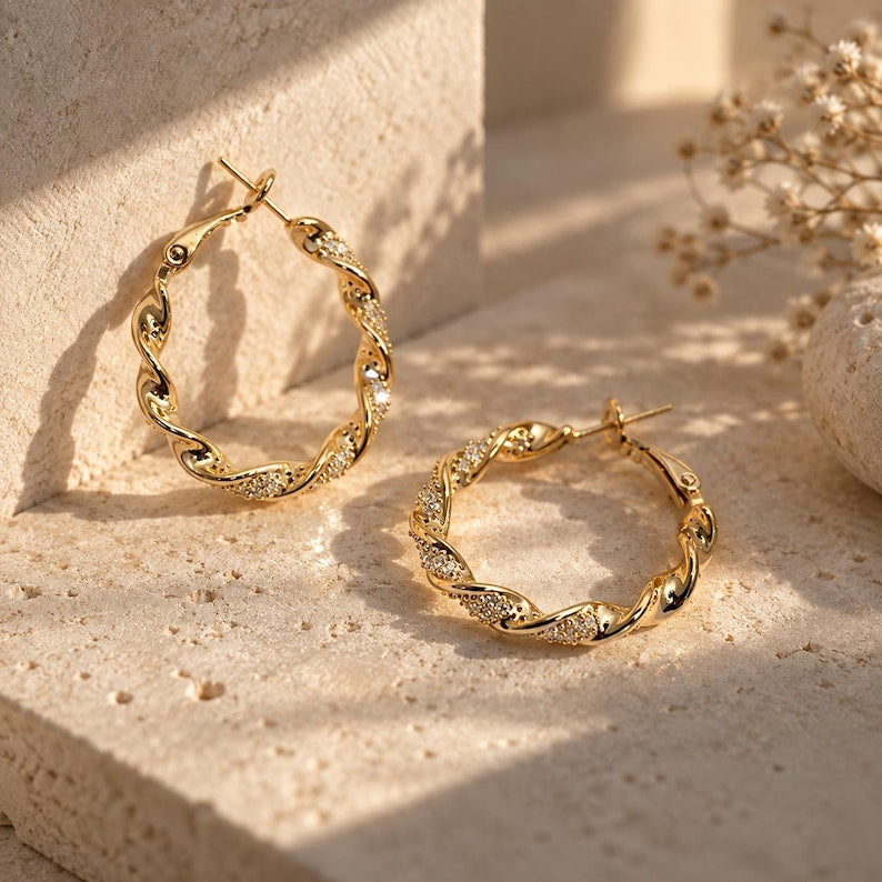 Gold and silver twisted crystal pave hoop earrings