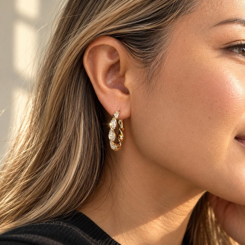 Gold twisted crystal pave hoop earring detail