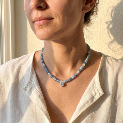 Moissanite center stone detail on beaded necklace