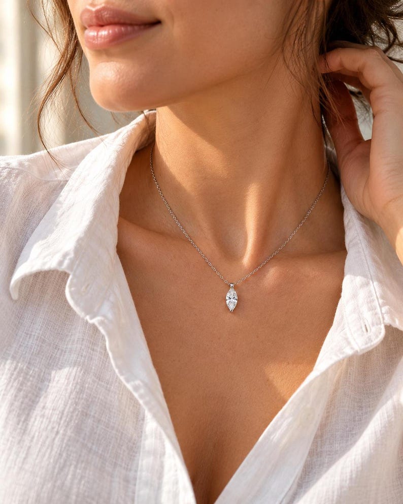 Marquise pendant necklace with white textured shirt