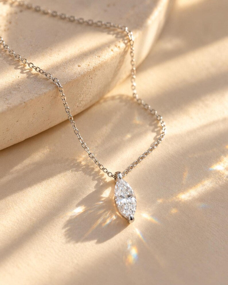 Marquise pendant necklace with rainbow light refractions